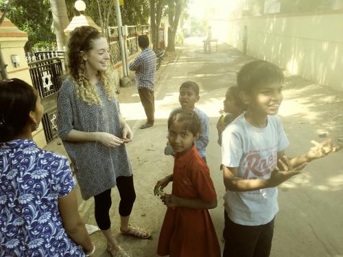 Leah-missions-team-member-ministering-to-the-neighborhood-kids